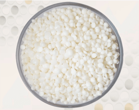 Coconut wax acts as a natural lubricant and slip enhancer in plastics. It improves surface smoothness, reduces friction, and supports better processing flow characteristics. Coconut Wax